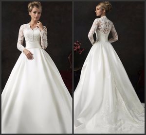 Compter Train Robes De Mariée À Manches Longues Iullsion Corsage Sexy Jewel Cou Couvert Bottons Élégant Dentelle Appliques Merveilleux Belle Vente Chaude