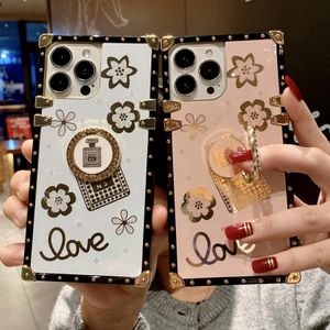 Glitter Flowers Perfume Case para iPhone 13 Pro Max 12 11 XS XR X 8 7 6 Plus Gold con anillo de dedo Stand Square Cover Nuevo