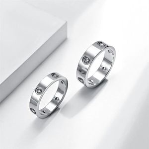 Diseño de anillo de amor de oro para hombres ama titanio acero diamante lujo para hombre diseñador anillos de plata mujeres diseños joyería de moda para mujer 2402