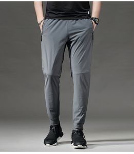 Pantalon de survêtement d'entraînement mince gris ajustement séchage rapide confortable Joggers hommes course pantalons longs Gym sport Fitness pantalon poche zippée