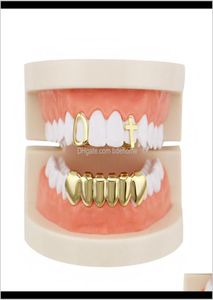 Parrillas dentales Grillz Entrega directa 2021 Conjunto de dientes de color dorado con fondo de fábrica Diseño mixto Diente falso Grillz Hiphop Cool Men B4776826