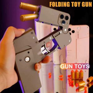 Gun Toys Nouveau pistolet de téléphone portable pliable pistolet à balle molle pistolet de tir à main jeté pour déformation pour cadeaux d'anniversaire pour adultes pour garçons 240307