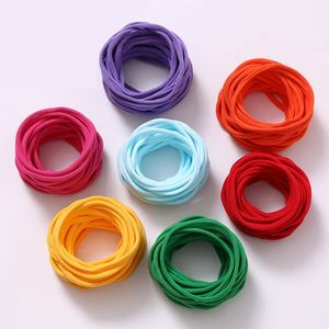 Accesorios para el cabello 100 Unids / lote Bebé Niña DIY Elástico Flaco Nylon Elástico Cena Suave Diadema Infantil Headwear Artículos 231019