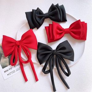 Accesorios para el cabello estilo coreano niños lindo pin gran lazo rojo con serpentina para niños clips simples moda niña