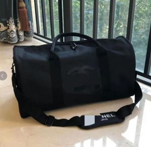 Haute qualité luxe mode hommes femmes voyage sacs de sport marque designer bagages sacs à main grande capacité sport sac polochon