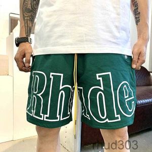 Haute qualité Rhude Mesh Quick Dry Shorts Designers Basketball pour hommes Pantalons courts 2024 Luxe Summer Beach Palm Lettre Street Fashion Pantalons de survêtementN5ZB N5ZB