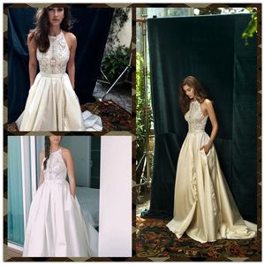 Hod Dresses Lihi Crystal Sin mangas Joya Cuello Apliques de encaje Vestidos de novia Bolsillos Tren de barrido Vestido de novia de satén de talla grande