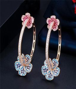 Hoop Huggie CWWZircons Designer élégant Micro Pave bleu rouge CZ couleur or clair grande fleur ronde boucles d'oreilles pour femmes bijoux G2523989