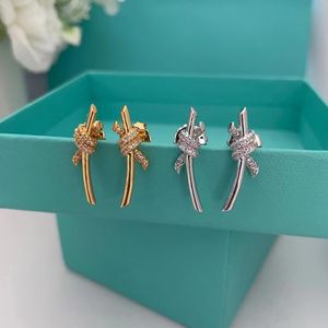 Venta caliente 925 plata esterlina encantador bowknot diseñador aretes para mujer brillante cristal dulce amor nudo pendiente aretes oreja anillos marca de lujo encantos joyería regalo