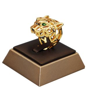 Gran oferta, anillos de joyería de marca Pantera a la moda hueca, ojo de piedra verde, anillo con cabeza de leopardo, anillos de joyería chapados en oro de 18k