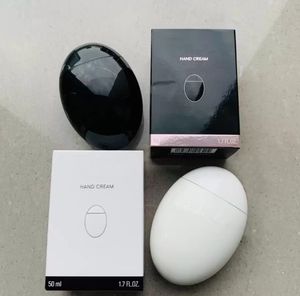 Hot selling black & white egg hand cream 50ml skin care LA CREME MAIN hands cream 50ml free shopping