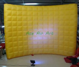 Mur de fond incurvé gonflable jaune avec lumières LED et corde fixe pour l'affichage de produits ou d'autres événements