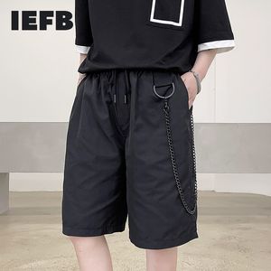 IEFB Verano Cuasal Rodilla Longitud Pantalones Moda Suelto Cordón Elástico Wiast Pantalones de playa negros con cadena Pierna ancha Y1236 210524