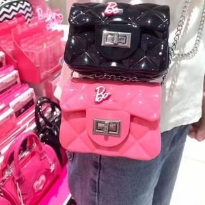 INS Niños bolsos de jalea rosa caliente Fahion niñas carta PVC bolsos de un solo hombro niños metales cadena bolsa de mensajero S0506