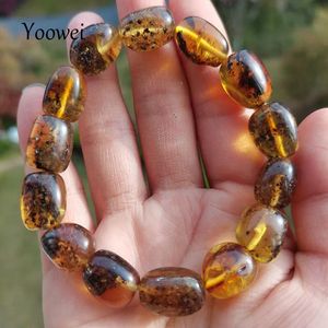 Bijoux 10g 27g Bracelet en ambre véritable pour unisexe 100% véritables perles noires ovales irrégulières plante naturelle verte bijoux de guérison médicale cadeau