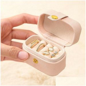 Boîtes à bijoux Petite boîte de rangement portable Pu Cuir Organisateur de voyage Bague Boucles d'oreilles Mini Vitrine Titulaire Cadeau Paquet Drop Delive Otwkl