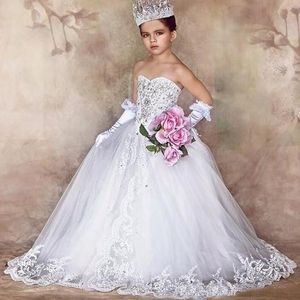 Impresionante vestido de novia de lujo para novias Bling Bling Cristales Apliques de encaje con cuentas Vestidos de niña de flores Con cordones Volver Arcos encantadores personalizados
