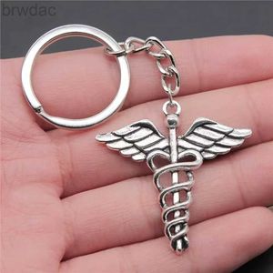 Anillos clave 1 PPCS Caduceus Símbolo Médico MD Mujeres para mujeres Accesorios de bolsas Bolsas Regalos Anillos de la cadena Soporte al por mayor NUEVO 2022 240412