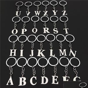 Anneaux clés lettres en acier inoxydable de tradavage alphabet A-Z Keychains Fashion Unisexe Bijoux Chaîne de chaîne de sacs de sac 26pcs / lot mixage Drop del Dhq3e