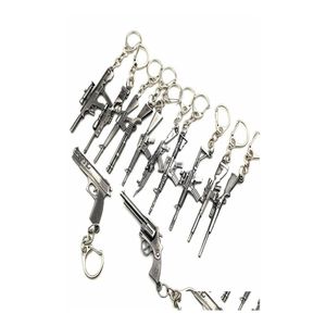 Llaveros enteros 50 piezas Juego Pistola Modelo Cadena Metal Aleación Llaves Titulares Tamaño 6 cm Blister Tarjeta Paquete Cadenas3388607 Entrega de gotas Jewe Dhrvc