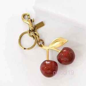 Portachiavi in cristallo stile ciliegia borsa da donna rossa ciondolo per auto accessori moda frutta fragola borsa decorazione123 J9M2