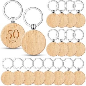 Keychains 50pcs / Set Round Wood Cléchette en bois vide en bois publicitaire artisanat