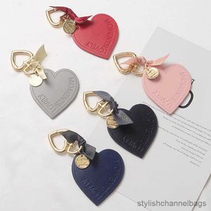 Porte-clés coeur amour porte-clés en cuir métal couleur or amour arc porte-clés sac coque de téléphone pendentif femmes mode bijoux