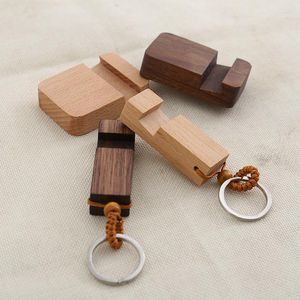 Llaveros Soporte para teléfono móvil de madera maciza Llavero Personalidad Llavero de madera multifuncional Colgante Precioso elefante Llaveros para mujeres