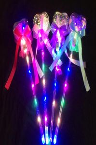 Niños Iluminación LED Varita mágica Hada Palos Arco Mano Escuchado Forma de estrella redonda Fiesta de bodas Concierto Decoración Regalo de San Valentín HHA9359663859
