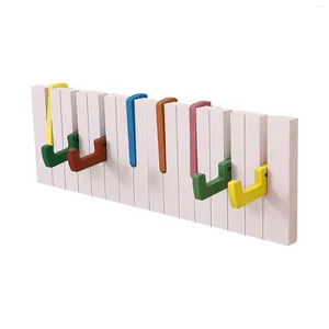 PIANO COMENTE Piano Rack Rack Montado de pared Made sin golpes Punch-Free Display para organizador de ropa para el hogar colgador de plástico creativo