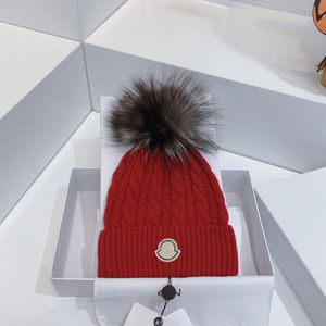 Gorro de punto Diseñador Invierno Sombrero de lana Hombres y mujeres Chunky Grueso Cálido piel sintética pom Tejido torcido Gorros Sombreros Gorro femenino Gorros monclair