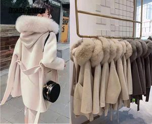 Versión coreana Abrigo largo de cachemira con capucha de piel de zorro real Cálido Espesar Bolsillos grandes Abrigo de mujer Outwear Abrigo de invierno CJ191214