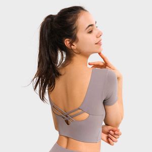 L-037 Vestido de yoga Tops de las mujeres Sexy desnuda cruzada trasera Volver al revés ombligo acolchado Sujetador de manga corta Camiseta Slim Stretch Sports Fitness Ropa interior Gimnasio