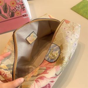 Señoras Diseñadores de lujo Marca Bolsa de maquillaje Bolsa de cosméticos clásica Moda Bolsa de lavado floral Bolsa de inodoro de cuero Accesorios de viaje para mujer