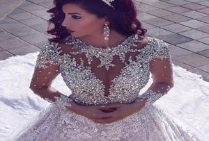 Dernières 2020 perles de luxe à manches longues robes de mariée musulmanes avec longue traîne paillettes dentelle robes de mariée Turke Robe De Mariage 461044910