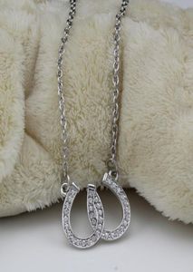 Joyería de plomo y níquel Collar colgante de zapatillas de doble caballo joyas de herradura ecuestres decoradas con cristal checo blanco10677785
