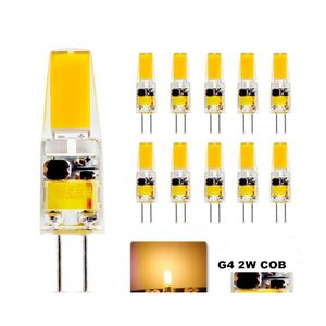 Ampoules LED 10X G4 2W BB Cob allumant 20 watts de remplacement de lumière halogène 210Lm 27003000K blanc chaud 12V AC/DC lumières de livraison directe Bbs Dh5Aq