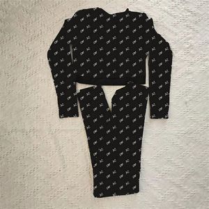 Lettres Femmes survêtements T-shirt Leggings Cropped Black à manches longues survêtements sportifs Tops de gym