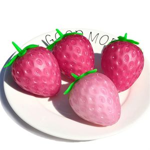 Jouets spongieux à la fraise à changement de couleur sensible à la lumière Boule de compression anti-stress aux fruits extensibles pour enfants et adultes