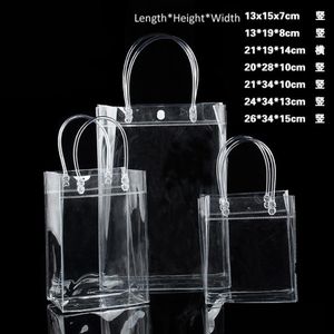 Limité 10 Pcs Lot Transparent Pvc Cadeau Fourre-Tout Sacs D'emballage Avec Boucle À La Main En Plastique Transparent Sac À Main Fermable Sac De Vêtement Vckrf240j