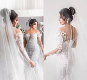 Vestidos de novia de sirena de manga larga Vestidos de novia Joya transparente Cuello de encaje Botones con apliques Volver Robe de mariee Vestido de novia árabe