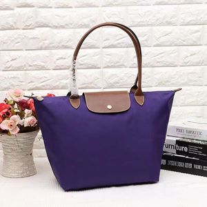 Longchammp Tote Luxury Designer Tote Sac Snap Snap Button Poldable Purple Grand Capacité Fashion Mode décontractée Sacs à bandoulirs Femmes Sac de voyage Sac de voyage