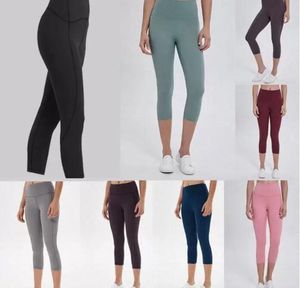 Les jambes de yoga de femme sans soudure costume pantalon cultivé la taille de la taille haute alignement sport fileté mi-veau collage hanches gym gym usure fi