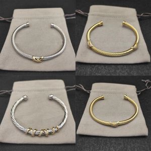 Diseñador de pulseras de lujo Dy Vintage Pearlets de cabeza de perla de diamantes de diario infructuosa para hombres Silvory Silver Gold Twisted Cable Bangles Men Jewelry ZL123 B4
