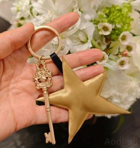 Porte-clés de luxe CoCo Designer Très belle clé en or Pendentif de bagage Porte-clés de voiture mignon pour charme Lady Star Porte-clés Meilleurs cadeaux de la Saint-Valentin