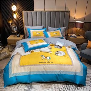 Juegos de cama de diseñador de algodón de lujo Juego de edredones de cama tamaño queen de invierno amarillo y azul