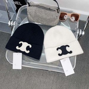 Sombreros de diseño de lujo Hats para hombres y mujeres Capa de gorro otoño Invierno Termal Termal Ski Moda Classical Climb Sports Sports Skull Brand Unisex Unisex Plaid Tap Bean