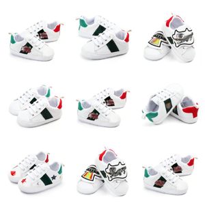 Diseñador de lujo para niños Primeros pasos Zapatos de moda para niños pequeños con cordones PU Estampado de algodón Cómodas zapatillas de deporte de goma Bebé Primavera Recién nacido Prewalker Zapato blanco 0-18 meses