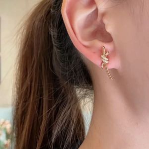 Pendientes de moda de lujo para mujer, joyería de diseñador, aretes de oro, pernos prisioneros, hipoalergénicos, atan un nudo, galvanoplastia de cobre, fashion2902