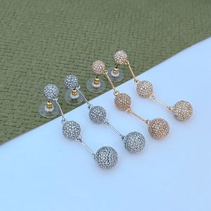Bola de geometría de lujo Pendientes de diseñador de borla larga para mujeres Cristal de oro de 18 km Cz Números de diamantes de circón tiene orejas de arete Oorbellen Anillos de orejas Joyas